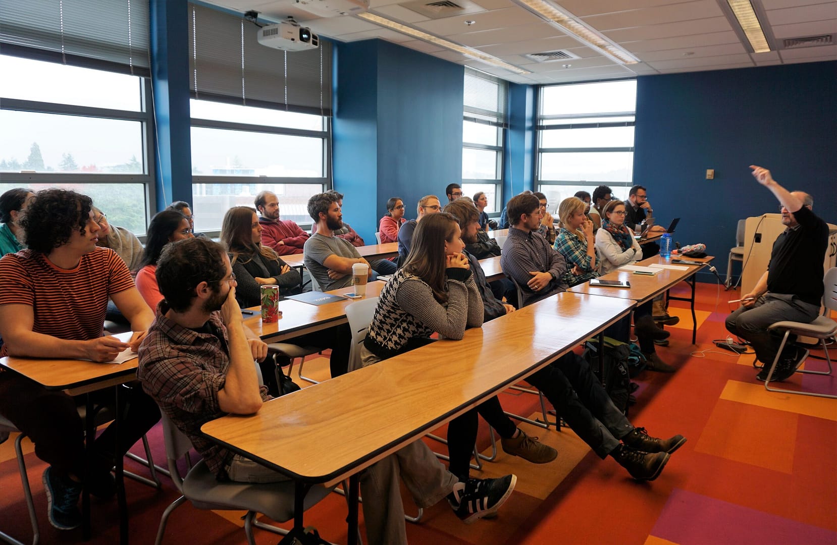 Postdoctoral fellows and graduate students gather for a career workshop featuring Tom Daniel. Photo by Robin Brooks